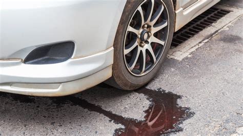 brown oil leaking from car|8 Reasons Your Car May Be Leaking Fluid